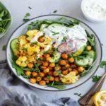 Spicy Chickpea and Roasted Cauliflower Bowl with Garlic Yogurt Sauce